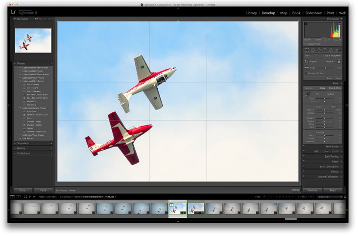 Lightroom's crop tool showing a golden ratio overlay on a photo of two jets