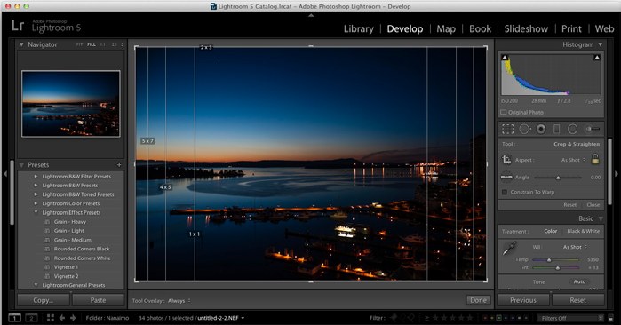 Lightroom 5's Develop module showing crop guide overlays on a harbour photo